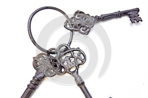 Three old keys attached to a ring