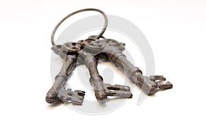 Three old keys in focus