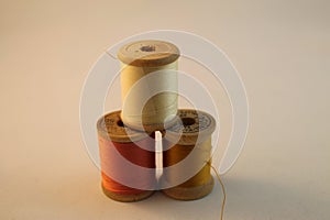 Three Wooden Spools of Thread