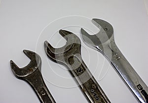 Three old working wrenches on a white background. Work Tool mechanic. Close up