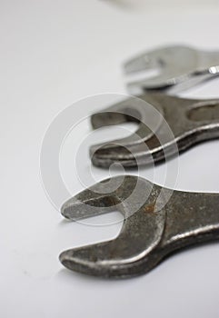 Three old working wrenches on a white background. Work Tool mechanic. Close up