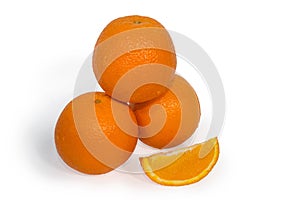 Three oranges and slice isolated