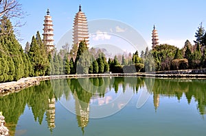 The reflection pond reflecting the image of the Three Pagodas