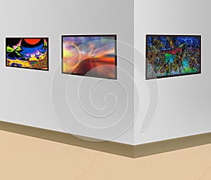 Three paintings with an abstract image are hanging on the wall i