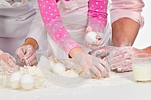 Family kneading dough