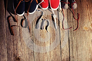 three pair of shoes representing family, growth, education and togetherness concept