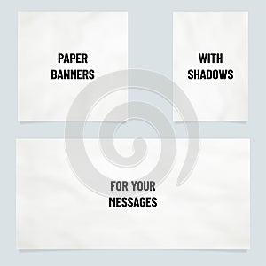 Three paper banners in different orientation with shadows