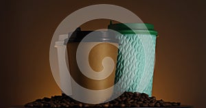 Three paper coffee cups spinning. Disposable cups for hot drinks. Coffee beans. Espresso, latte, cappuccino for take away