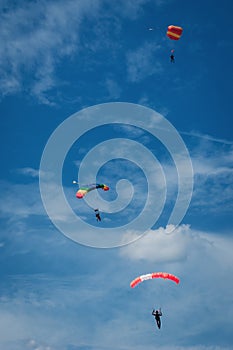 Three Parachutists in air