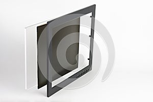 Three part of LCD monitor, firtst  plastic frame,  the second  panel consists of polarizing filters, glass and  liquid-crystal