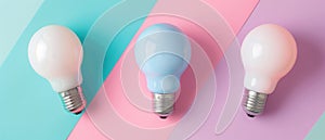 Three pastel-colored light bulbs on a tri-color background banner, perfect for articles on creativity, innovation, and