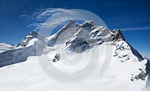 Three peaks in Swiss Alps: Monch, Jungrau, Eiger