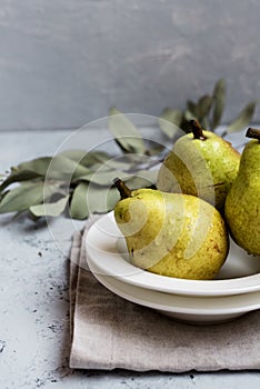 Three pears on plate