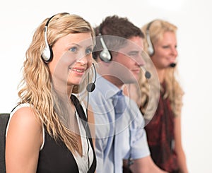 Three people in a call centre