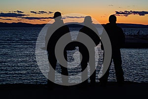 Three people silhouette