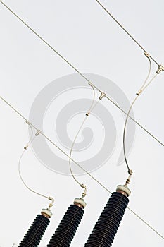 Three-phase electrical lines and ceramic insulators