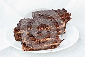 Three pieces of chocolate cake