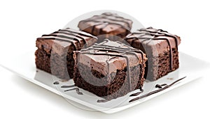 Three pieces of chocolate cake with chocolate drizzle