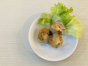 three pieces of deep-fried crab meat rolls or “Hoi jo pu”