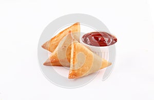 Three Pieces golden samosa stuffed on white background