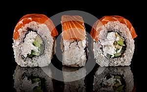 Three pieces of sushi rolls Philadelphia