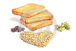 Three pieces of toast bread with heart of grains of wheal on white background