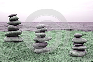 Three piles of balanced stones