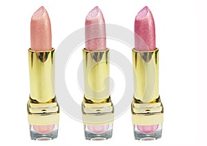 Three pink lipsticks