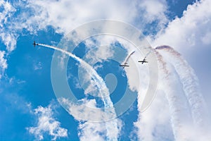 Three Planes in the Cloudy Blue Sky