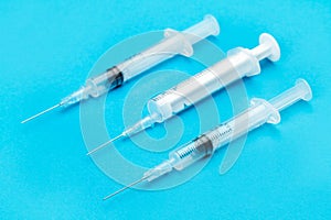 Plastic disposable syringes