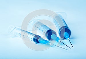 Three plastic syringe