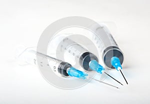 Three plastic syringe