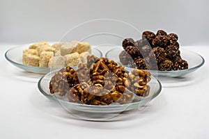 Three Plates Full of Sesame Ladoo, Til ko Laddu, Jaggery Peanuts Laddoo for Maghe Sankranti and Makar Sankranti Festival