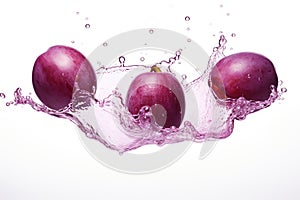 Three plums are splashing into the water. Digital image.