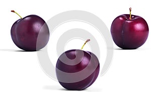 three plums on a white background isolated