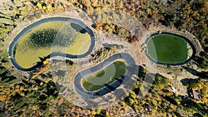 Three ponds with algae in Uinta Wasatch Cache National Forest during autumn time