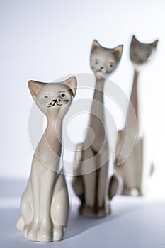 Three Porcelan Cat Figurines With Long Necks