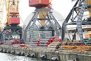 Three port cranes with the cargo