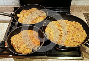 three pots of Frico an italian food of Friuli Region in Italy ma