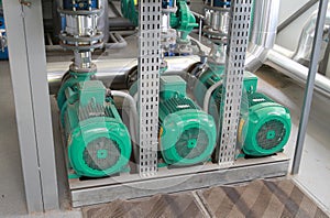 Three powerful green pumps