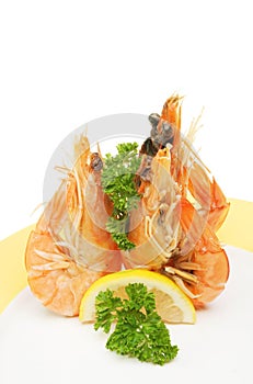 Three prawns on a plate