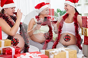 Three pregnant women celebrate new year