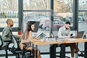 Three professionals sitting at a table