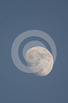 A three-quarter moon at daytime over Dubai