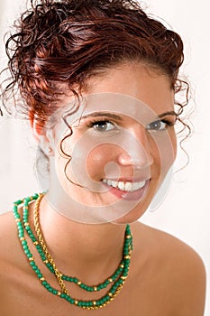 Three Quarter View of Smiling Young Woman photo