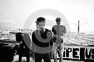 Three rap singers band on the roof