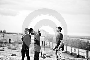 Three rap singers band on the roof