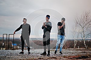 Three rap singers band on the roof