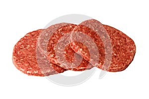 Three raw hamburger patties white background
