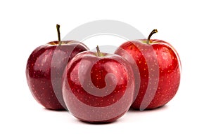 Three red apples